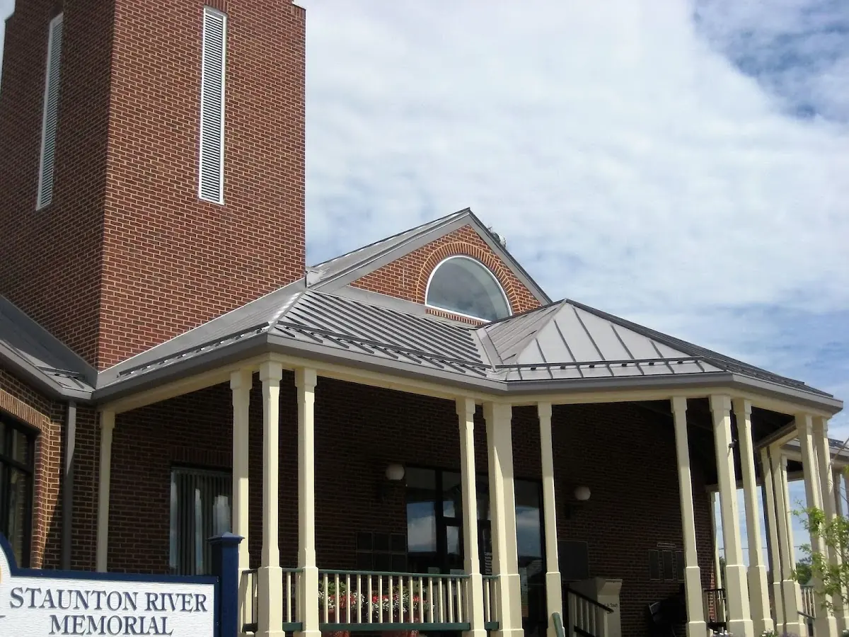 Skilled roofing craftsmen working on a residential roof in Montrose